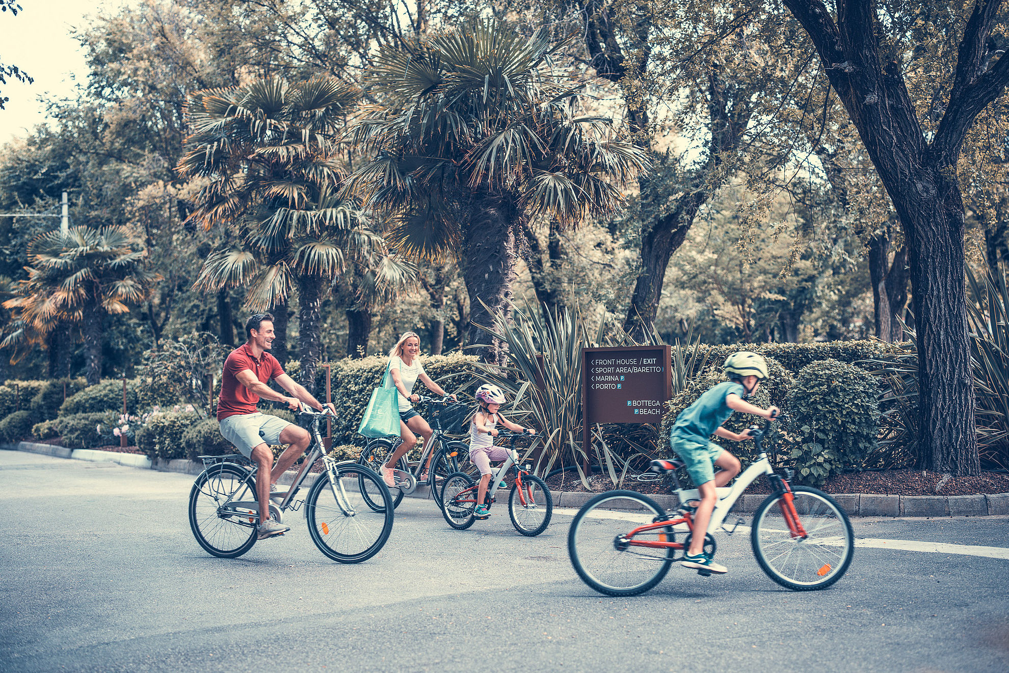 Family going for a bike ride