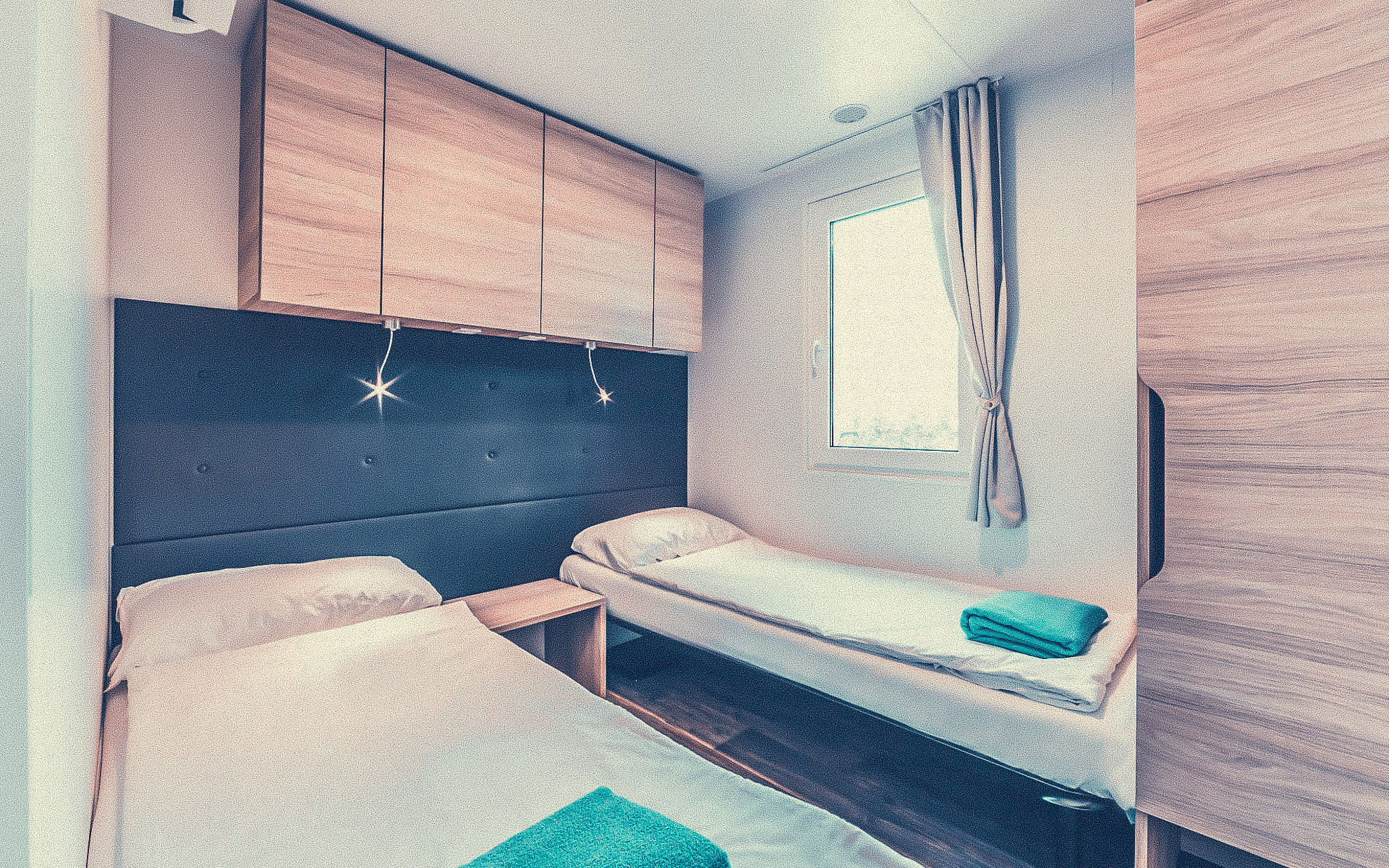 Zweibettzimmer im Cottage des Resort Tenuta Primero